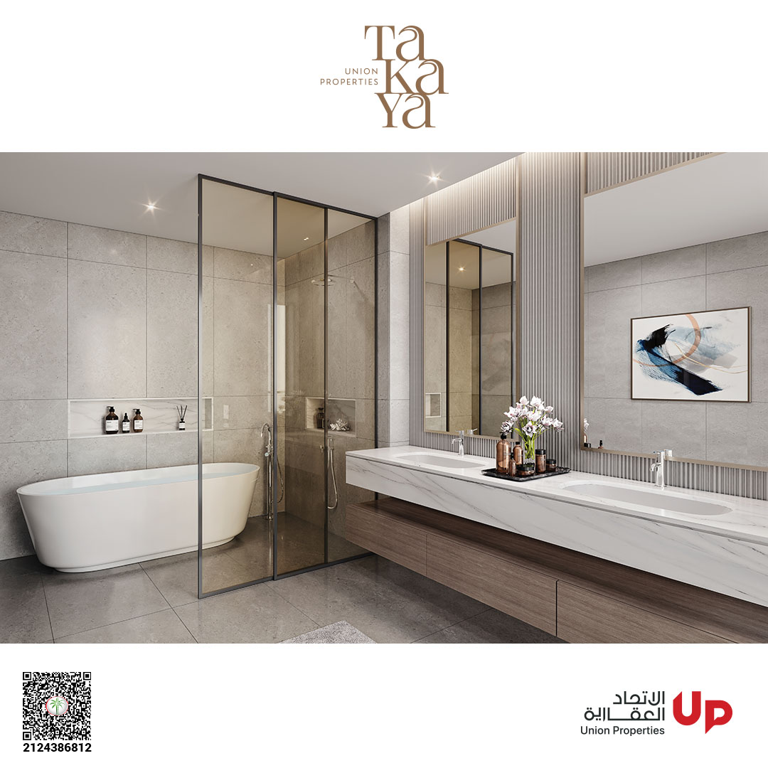 Freestanding bathtub in a marble TAKAYA bathroom